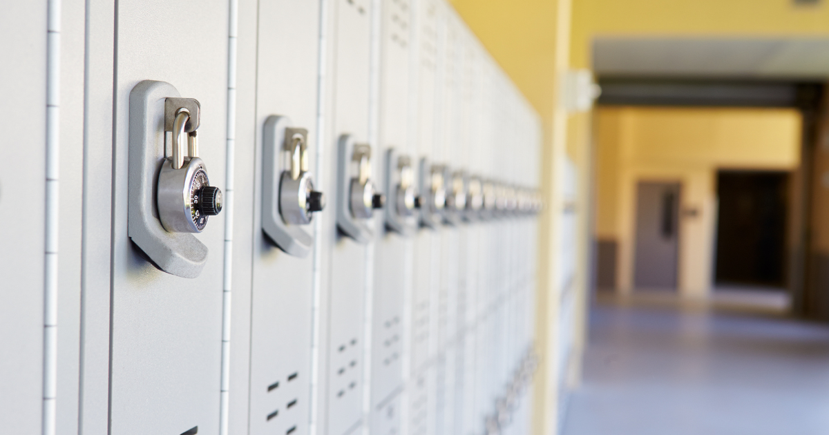 Q&A with School Shooting Expert Tom Czyz - School with fence in foreground